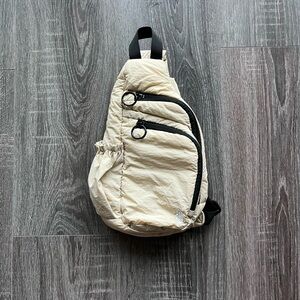 FP Movement Cream and Black Belt Bag Asymmetrical Design